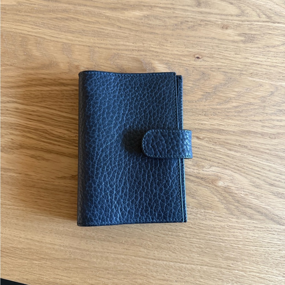 Elegant Black Leather notebook cover
Vintage Dooney and Bourke